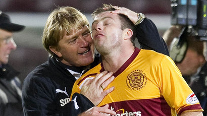 121698-motherwell-manager-stuart-mccall-left-with-steven-jennings.jpg