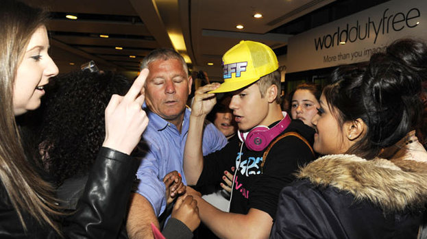 Fan frenzy: Justin Bieber is mobbed followers wherever he goes