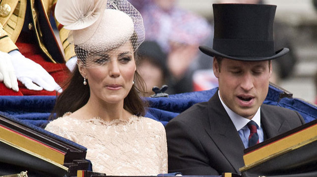 Queen of style: Kate Middleton sits in a carriage alongside husband Prince William at the Diamond Jubilee