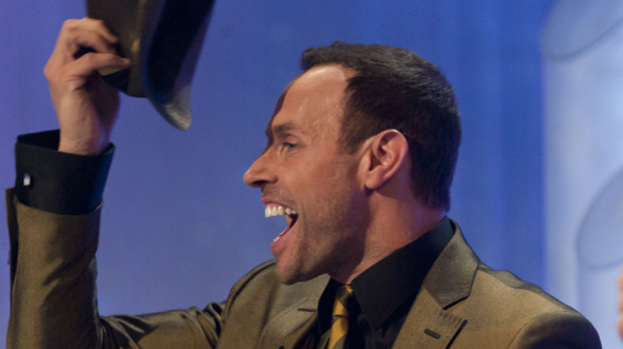 Bald truth: Jason lifts his hat on the do