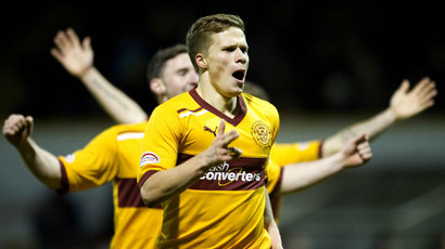 173809-henrik-ojamaa-wheels-away-in-celebration-after-scoring-to-bring-motherwell-back-on-level-terms-at-2-.jpg