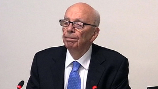 Lips firmly sealed: Rupert Murdoch had plenty to talk about at inquiry this week